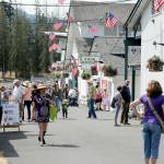 Clallam County Fair attendees stroll the midway during this years fair last August. (Keith Thorpe/Peninsula Daily News)