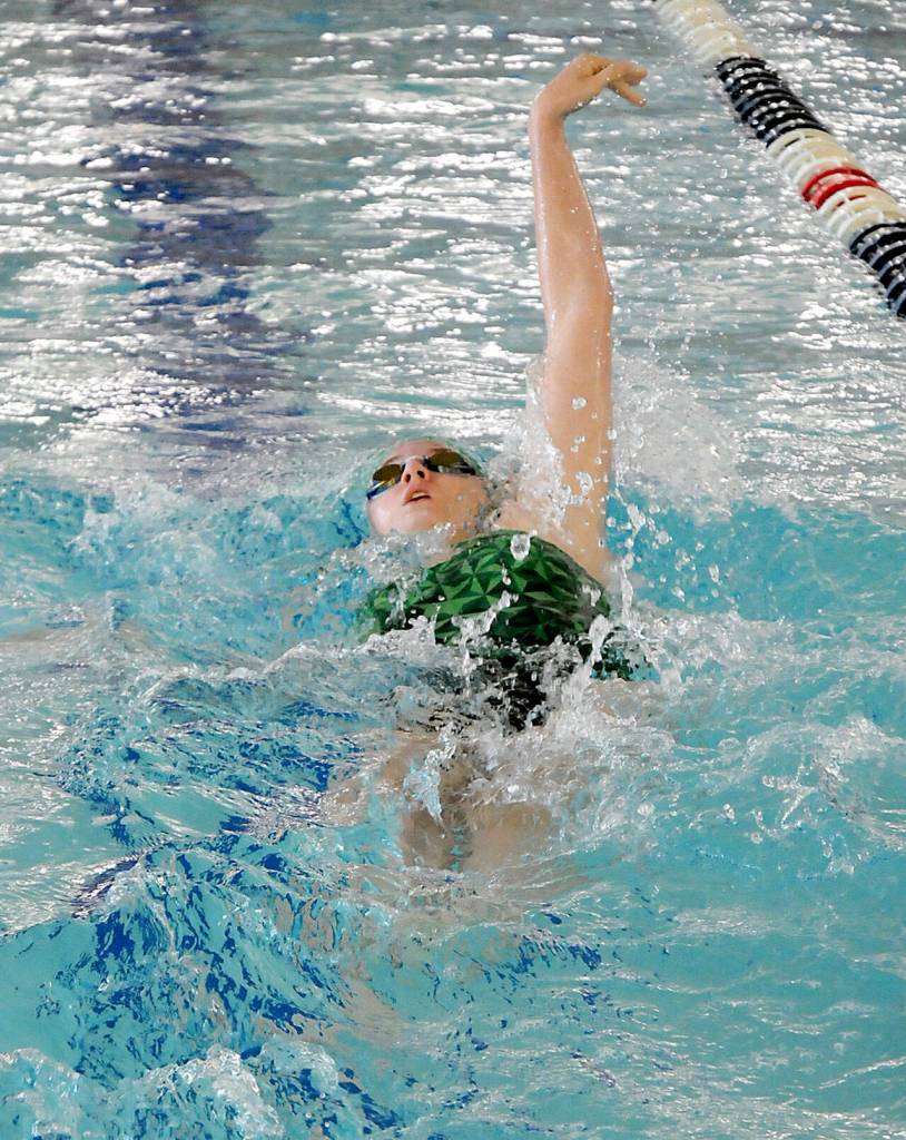KEITH THORPE/PENINSULA DAILY NEWS Harper McGuire of Port Angeles does the backstroke leg of the 200-yard individual medley during Wednesdays meet against Klahowya at Shore Aquatic Center in Port Angeles.