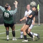 KEITH THORPE/PENINSULA DAILY NEWS
Peninsula's Sydney Soskis, center, watches as a ball sails past Shoreline goalkeeper Jonna Tucker, left, and defender Maggie Kozlowski on Saturday at Wally Sigmar Field.