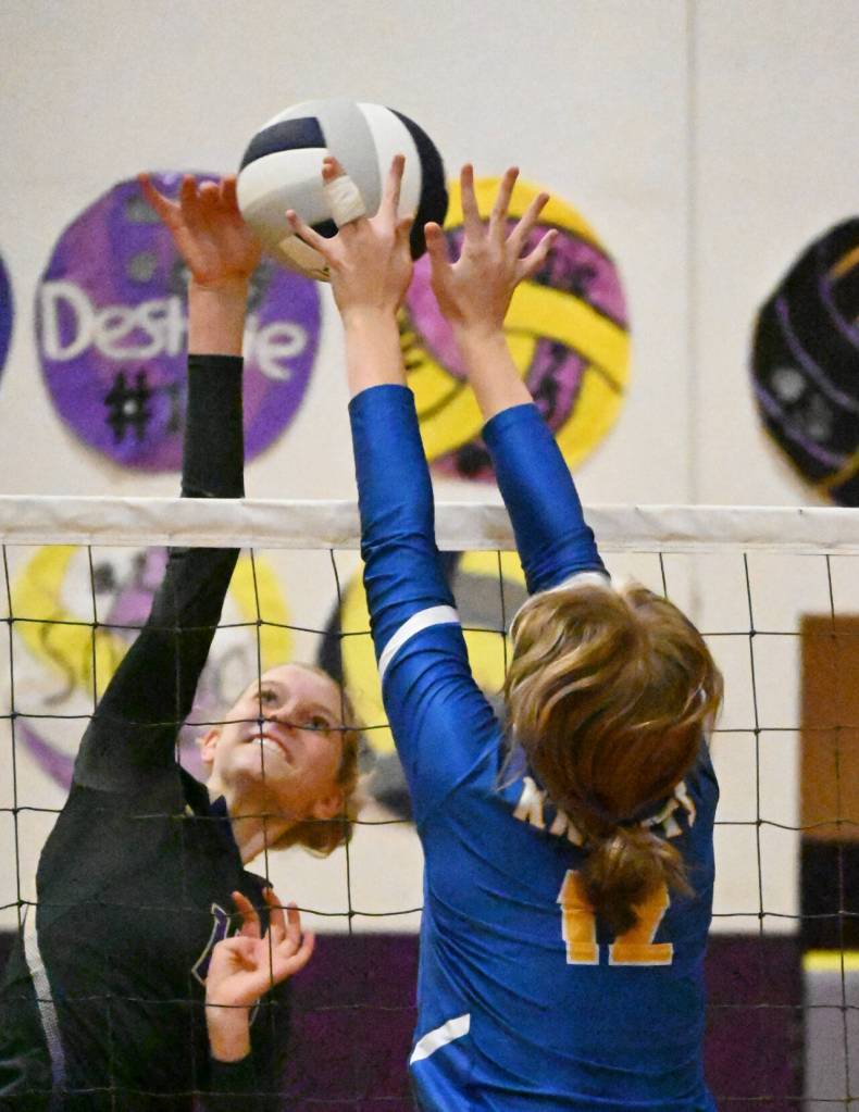 Olympic Peninsula News Group Sequims Kendall Hastings hits a shot past Bremertons Cora Taylor in the Wolves three-set home win on Sept. 29.