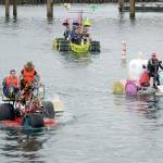 Despite the rain and cooler temperatures teams were in high spirits as they tackled the water course on day at an earlier Kinetic Skulpture Race in Port Townsend. (Peninsula Daily News)
