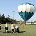 A hot air balloon rises from the soccer field of the Wally Sigmar Athletic Complex at Peninsula College in Port Angeles for tethered rides on Saturday as part of the Peninsula College Fall Spectacular. The event, hosted by the school to bring the community to the campus, also featured displays and demonstrations, childrens activities, food and music. (Keith Thorpe/Peninsula Daily News)