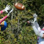 KEITH THORPE/PENINSULA DAILY NEWS
Neah Bay's Adam Ellis, right, attempts to catch a pass over the head of Crescent's (NO.4 -- not on roster) on Saturday in Joyce.