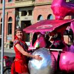 RoseHips Kween Pheanamix, also known as Anami of Port Townsend, cozies up to the Goddess Bunny sculpture just before the start of the Great Port Townsend Bay Kinetic Skulpture Race on Sunday morning. The race got underway at noon on Water Street, then ran uphill on Monroe and Lawrence streets, heading for the beach at Fort Worden State Park, and then the Dismal Bog at the Jefferson County Fairgrounds. (Diane Urbani de la Paz/For Peninsula Daily News)