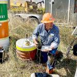 Curtis Shuck, chairman of the Well Done Foundation, a non-profit organization that works to cap abandoned oil and gas wells, conducts testing on a well in West Jefferson County. The well, located near the Hoh River in an area known as Oil City, is leaking emissions, and Shucks foundation is working to properly seal it. (Well Done Foundation)