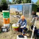Curtis Shuck, chairman of the Well Done Foundation, a non-profit organization that works to cap abandoned oil and gas wells, conducts testing on a well in West Jefferson County. The well, located near the Hoh River in an area known as Oil City, is leaking emissions, and Shucks foundation is working to properly seal it. (Well Done Foundation)