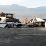 Remains of the broken pleasure craft Eudora await disposal at a staging area on Ediz Hook in Port Angeles on Wednesday morning. (Keith Thorpe/Peninsula Daily News)