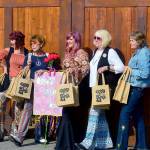 Preparing to celebrate Girls Night Out in downtown Port Townsend on Thursday afternoon are, from left, Holly Erickson, Lorilee Houston, Eryn Smith, Sue Arthur and Mari Mullen. After a hiatus, the Main Street Program-hosted annual event returned to distribute goodie bags, encourage women to shop local and raise funds for the Jefferson Healthcare Foundation. The foundation helps provide free breast/cervical cancer screenings for women in need. (Diane Urbani de la Paz/For Peninsula Daily News)