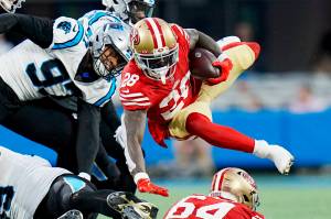 San Francisco 49ers running back Tevin Coleman runs against the Carolina Panthers during the second half an NFL football game on Sunday, Oct. 9, 2022, in Charlotte, N.C. (AP Photo/Rusty Jones)