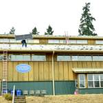 An array of 164 solar panels have been installed on roofs at the upper campus of the Northwest School of Wooden Boatbuilding. (Elizabeth Becker)