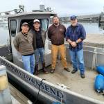The Northwest School of Wooden Boat Buildings Marine Systems program, led by Lead Instructor Kevin Ritz, far right, helps students apply new skills to real-world projects. Recent graduate Andy Politz, far left, will serve as a Prothero Intern on this pump out boat conversion project with support from instructors Tyler Johnson and Jordan Primus. (Northwest School of Wooden Boat Building photo)
