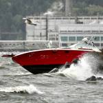 A power boat was driven onto rocks at Port Townsend Boat Haven after storm-driven winds whipped the bay into a frenzy of white caps about mid-day Tuesday. (Steve Mullensky/for Peninsula Daily News)