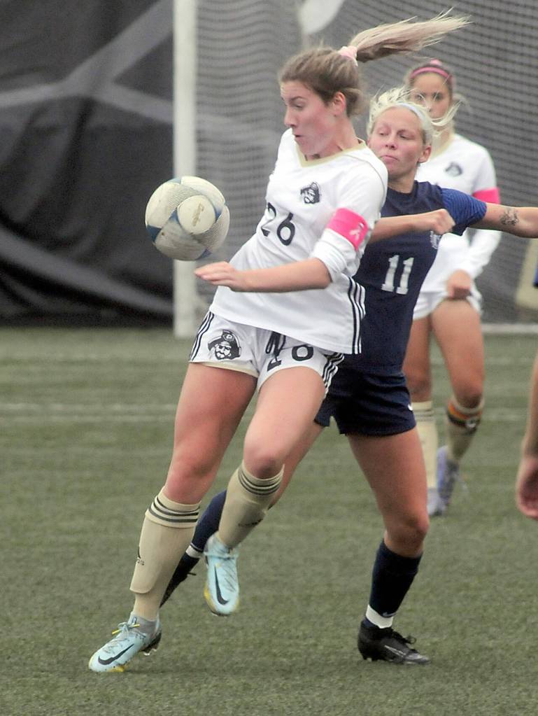 KEITH THORPE/PENINSULA DAILY NEWS
Peninsula's Kenzie Banner steps ahead of Bellevue's Daisy Morris on Wednesday in Port Angeles.