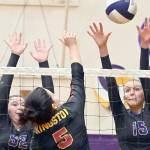 Sequim's Sammie Bacon, left, and Kendall Hastings attempt to defend against a shot by Kingston's Grace Mosco as Kingston libero Lily Wright looks on during the Wolves 3-0 senior night victory on Thursday.