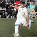KEITH THORPE/PENINSULA DAILY NEWS Peninsulas Yusaku Shimakura takes a penalty kick that resulted in Saturdays initial point against Skagit Valley on Saturday in Port Angeles.