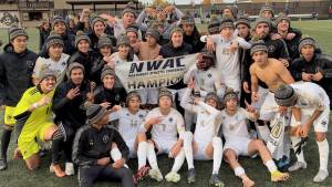Peninsula College
The Peninsula College men's soccer team celebrates winning the North Region on Saturday with a 2-1 win over Skagit Valley.