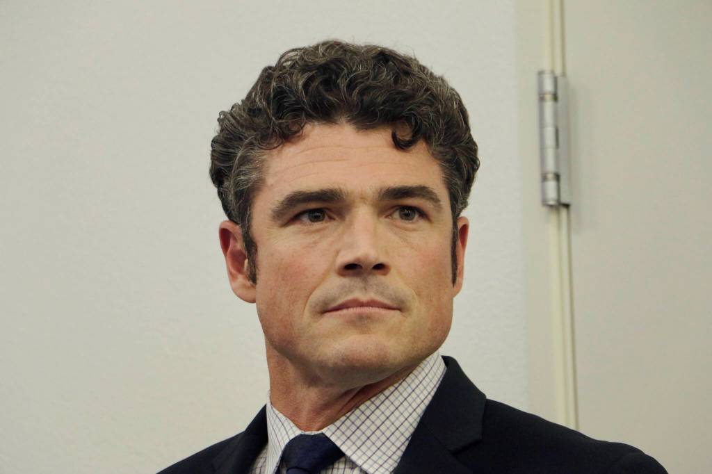 Republican candidate Joe Kent waits before taking the stage for a candidates debate Sept. 27 in Vancouver, Wash. Kent is seeking election to Washingtons 3rd Congressional District in Tuesdays election. The House GOPs Class of 2022 midterm candidates includes a distinct group  a new generation of political outsiders, populists and some extremists. They would bring an untested and potentially unruly majority if Republicans win the House. (Rachel La Corte/The Associated Press, file)