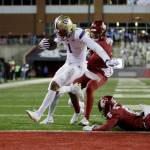 Washington wide receiver Rome Odunze (1) runs for a touchdown during the second half of an NCAA college football game against Washington State, Saturday, Nov. 26, 2022, in Pullman, Wash. Washington won 51-33. (AP Photo/Young Kwak)