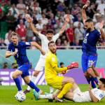 Goalkeeper Matt Turner of the United States makes aa save during the World Cup group B soccer match between Iran and the United States at the Al Thumama Stadium in Doha, Qatar, Wednesday, Nov. 30, 2022. (AP Photo/Manu Fernandez)