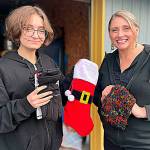 Matthew Nash/Olympic Peninsula News Group

For the second year, River Jensen, left, and her mom Anna Larsen plan to use stockings for River’s Christmas Project to supply toiletries to local homeless people and others in crisis. River, now 16, started the project seven years ago.