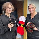 For the second year, River Jensen, left, and her mom Anna Larsen plan to use stockings for Rivers Christmas Project to supply toiletries to local homeless people and others in crisis. River, now 16, started the project seven years ago. (Matthew Nash/Olympic Peninsula News Group)