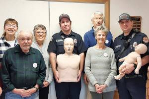Front row, from left to right, Sara Penhallegon, Bob McDaniel, Christine Satterlee, Kevin Winn, Tim McKern and in the back row, from left to right, Rosalyn Roberts, Kay Peterson, Zak Torres and Bob Bindschadler
