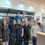 Pictured in the front row, from left to right are Bella Sains, Ana Gustafson, Leyla Price, Brenna Murphy, Michael Aranda and Andrew Corson. Back row, left to right are Sea Scout leader Jared Minard, Elliot Dahlin, Rynn Hays, Adian Carlquist-Bundy and Michael Rodgers. Not pictured are Dean Spaulding, Ella Schulz, Ozzy Minard and Jonathan Bridges.