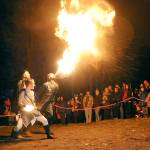 Members of The Fractal Phase, from front, Nova Cain, Pumba Burns and Ahnrix Bishop, breathe fire and preform dance with flames during Saturdays Wintertide Festival of Light at the Port Angeles Fine Arts Center. The event featured music, entertainment, a lantern parade and other yule activities to celebrate the winter solstice. (Keith Thorpe/Peninsula Daily News)