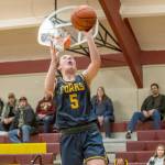 Forks Keira Johnson skies for a layup during the Spartans 74-25 win over South Bend on the road Friday night. (Eric Trent/Daily Chronicle)