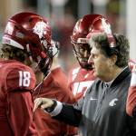 Washington State head coach Mike Leach, right, speaks with quarterback Anthony Gordon (18) during the second half of a game against Stanford in Pullman on Nov. 16, 2019. (Young Kwak/The Associated Press)