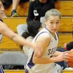 Matthew Nash/Olympic Peninsula News Group
Sequim's Tary Johnson, right, looks to get past North Mason's Felicity Fowler in a 53-27 home win over North Mason on Dec. 15. Johnson had four points, three rebounds and two assists against the Bulldogs.