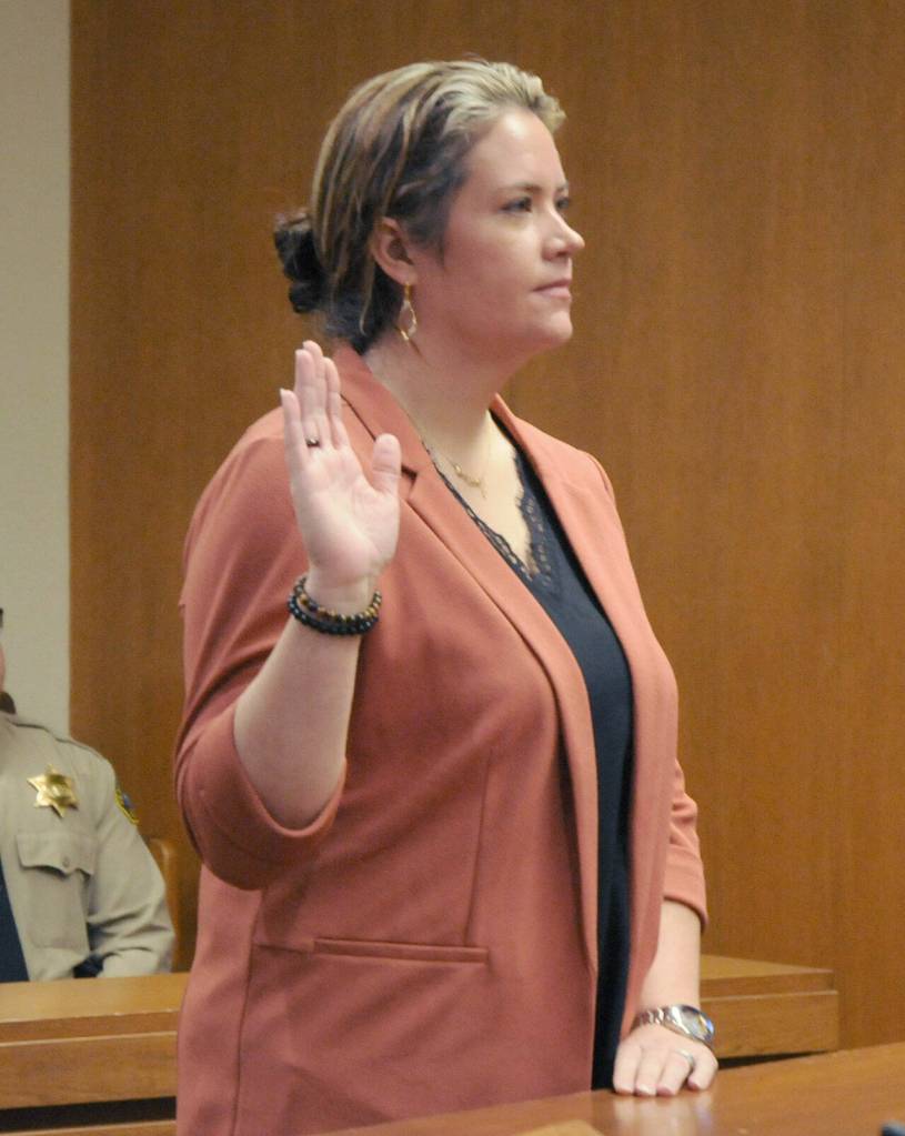 Jennifer White takes the oath on Wednesday for her term as Clallam County Treasurer. (Keith Thorpe/Peninsula Daily News)