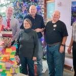 Pictured, from left to right are Shawn Gould, Mike Loucks, Debbie Peterson, Tom Hartig, Richard Suskind and Amala Kuster