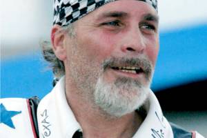 FILE - Robbie Knievel appears after his motorcycle jump before the start of the IRL Firestone 550 auto race at the Texas Motor Speedway in Fort Worth, Texas on June 5, 2010. Knievel, an American stunt performer, died early Friday at a hospice in Reno, Nev., with his daughters at his side, his brother Kelly Knievel said. He was 60. (AP Photo/Randy Holt, File)