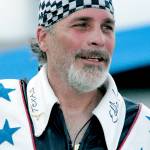 Robbie Knievel appears after his motorcycle jump before the start of the IRL Firestone 550 auto race at the Texas Motor Speedway in Fort Worth, Texas on June 5, 2010. (AP Photo/Randy Holt)