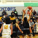 Brody Lausche (22), goes up for a jumper against Chief Leschi earlier this week. Lausche scored 11 points Friday night in a 58-21 victory over North Beach. Also in on the play are the Spartans Dylan Micheau (10) and Kyle Lohrengel (11). (Lonnie Archibald/for Peninsula Daily News)