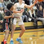 Keith Thorpe/Peninsula Daily News Port Angeles Parker Nickerson, right passes the ball as Rentons Jordan Agosto looks on during Saturdays game in Port Angeles.