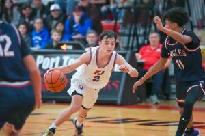 East Jefferson's Brody Moore drives against the Life Christian defense Monday in Port Townsend. Moore finished the game with 13 points. (Steve Mullensky/for Peninsula Daily News)