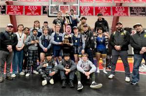 Courtesy of Forks wrestling
The Forks boys wrestling team celebrates its District 4 1B/2B subregional championship this weekend. It was the ninth meet this year the Spartans have won as a team.