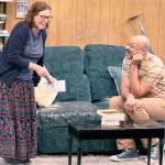 Maude Eisele (Mabel) and Brace Evans (Todd) become acquainted in an awkward matchmaking scene in The People Downstairs at Key City Public Theatre.