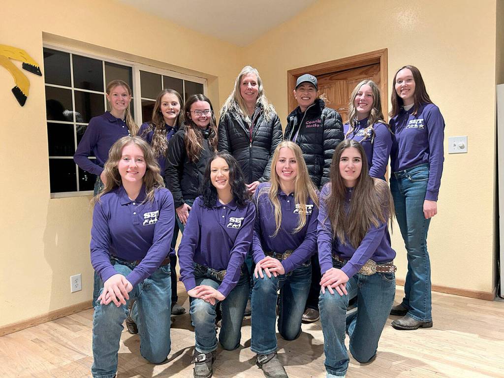 Sequims High School Equestrian Team, Back row left: Celbie Karjalainen, Kennady Gilbertson, Assistant Coach Keri Tucker, Coach Bettina Hoesel, Coach Katie, Salmon-Newton, Paige Reed, Katelynn Sharp. Front Left: Rylie Smith, Sydney Hutton, Libby Swanberg, Lily Meyer.