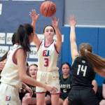 Steve Mullensky/for Peninsula Daily News East Jefferson Rival Kay Botkin shoots from outside the key during a Nisqually League game played in Chimacum against the Klahowya Eagles.