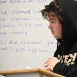 Finn Marlow scrutinizes a witness during a Mock Trial club practice last week. (Michael Dashiell/Olympic Peninsula News Group)