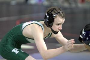 Steve Powell/North Kitsap Herald
Port Angeles freshman Alex Burrow grapples with his opponent during a match Friday at Mat Classic XXXIV, the state wrestling championships, at the Tacoma Dome.