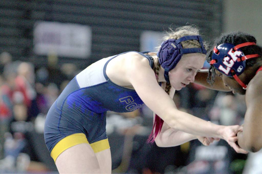 Forks Miley Blanton wrestles against Life Christians Tebisi White at the Mat Classic. Blanton finished sixth at 120 pounds. (Courtesy of Steven Powell)