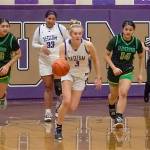 Sequims Jolen Vaara pushes the ball up the court with Jelissa Julmist trailing. The Wolves will play No. 1-ranked Ellensburg in the state regionals Friday night. (Emily Mathiessen/Olympic Peninsula News Group)