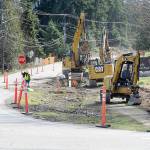 KEITH THORPE/PENINSULA DAILY NEWS
Excavators work along a section of Mount Angeles Road near the Olympic National Park visitor center on Thursday as part of a project to improve the Race Street corridor from Olympus Avenue to Eighth Street in Port Angeles. Phase one of the project, which will require occasional lane closures and detours, will include utility upgrades and isafety improvements for pedestrians, bicyclists, vehicles and transit users. Later phases of the project will extend from Eighth Street to the Port Angeles waterfront.