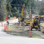 Excavators work along a section of Mount Angeles Road near the Olympic National Park visitor center on Thursday as part of a project to improve the Race Street corridor from Olympus Avenue to Eighth Street in Port Angeles. (KEITH THORPE/PENINSULA DAILY NEWS)