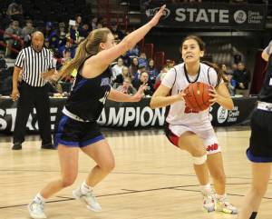 Neah Bay's Amber Swan drives against Oakesdale in the state 1B quarterfinals Thursday. Neah Bay beat Oakesdale, then beat Mount Vernon Christian in the semifinals Friday. Swan had seven points and nine rebounds in Friday's victory. The Red Devils will play for the state 1B championship Saturday. (Byrne Bennett/Cheney Free Press)