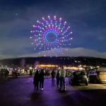 A spiral made up of 200 drones flies above crowds in and near Carrie Blake Community Park for the Sequim Sunshine Festivals Illuminated Drone Show. (Matthew Nash/Olympic Peninsula News Group)